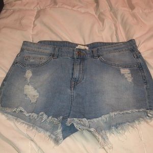 DISTRESSED DENIM SHORTS